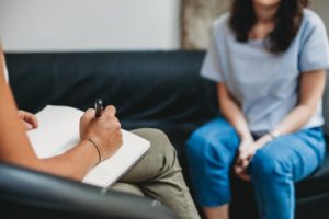 Patient talks with therapist about the benefits of medication assisted treatment