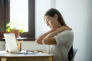 Tired exhausted woman sitting and relaxing in office