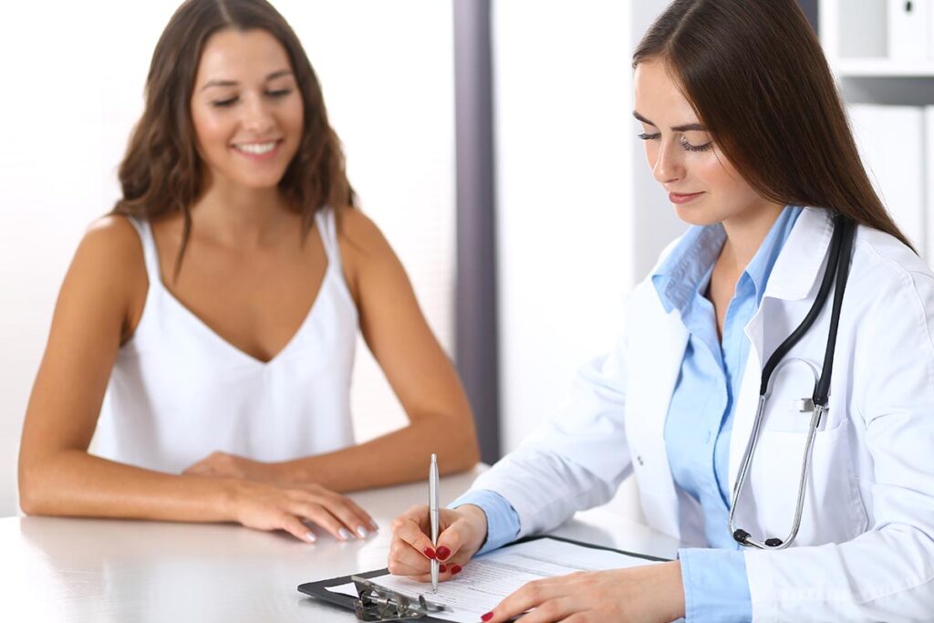 woman and doctor discuss detox before inpatient treatment