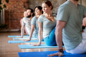 participants in a yoga class learning how can yoga help during addiction recovery