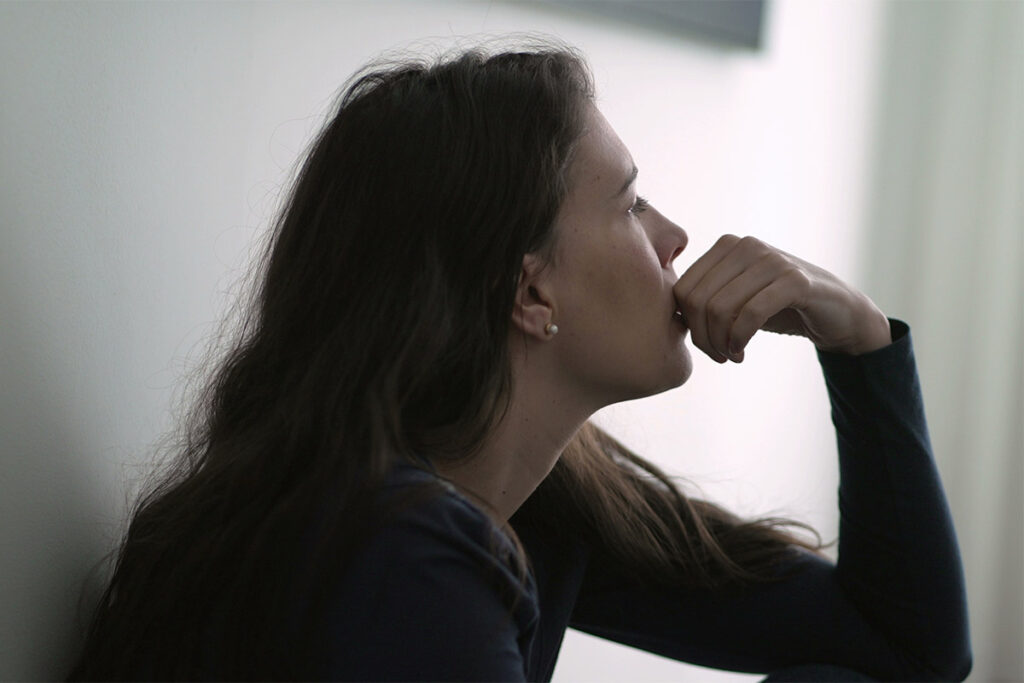 a woman struggles to manage depression and alcohol addiction simultaneously