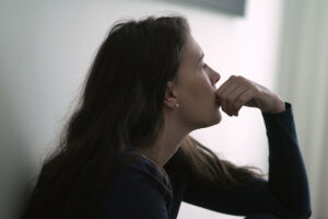 a woman struggles to manage depression and alcohol addiction simultaneously