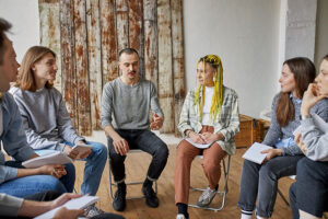 people in group therapy in an outpatient treatment program