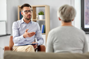 a person talks to a therapist during co-occurring disorders treatment