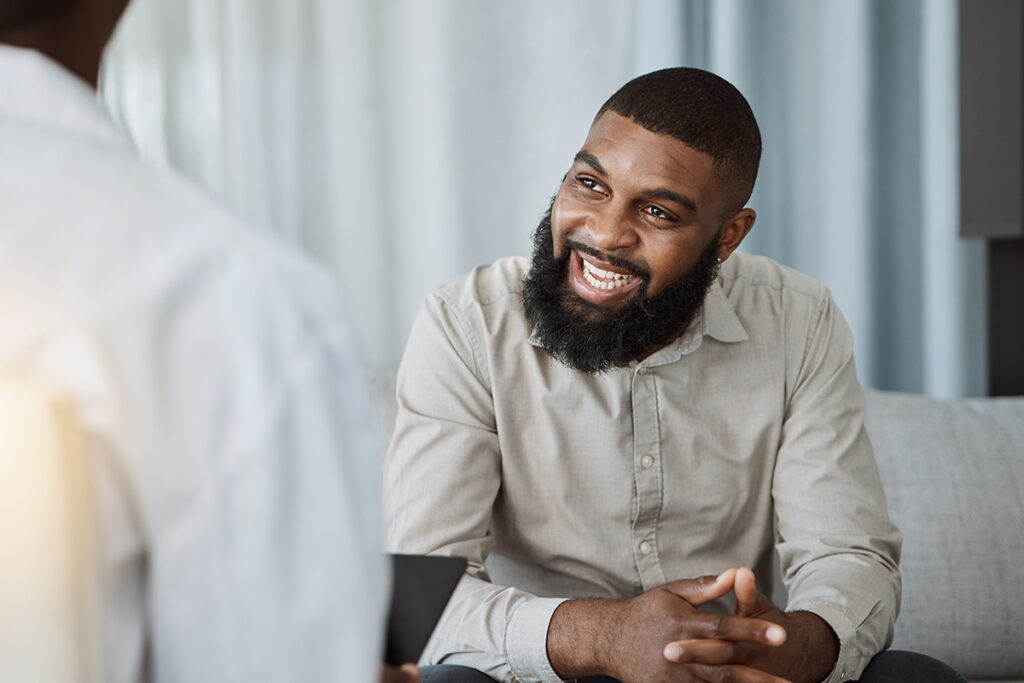 a man talks to a therapist about what to expect during detox